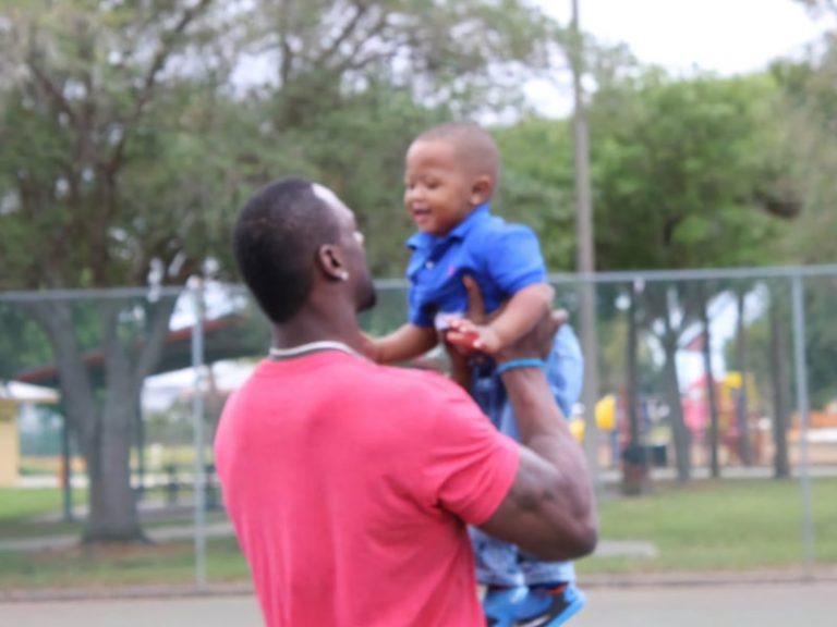 Jevon Kearse Spending Time With an Infant Child.
